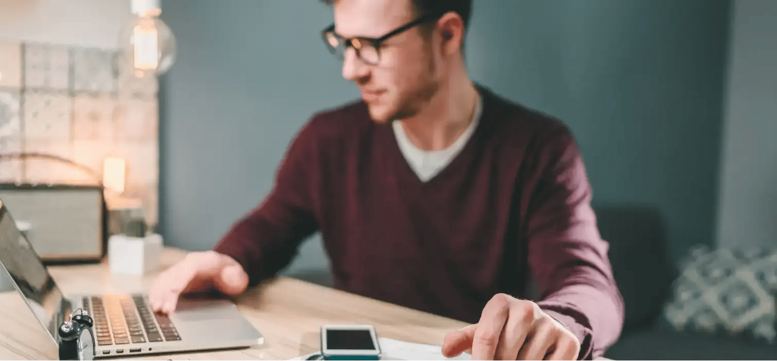 Man analysing his financial reports on Xero, a cloud accounting software.