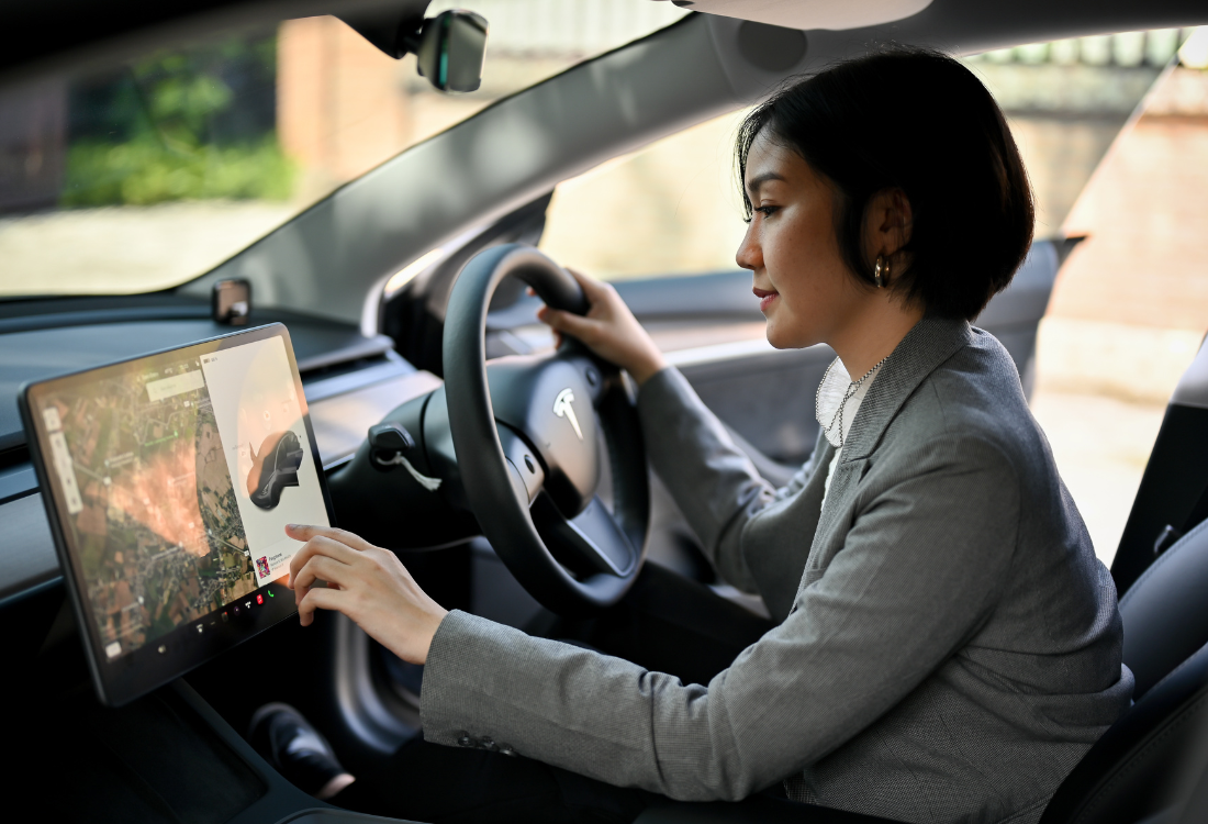A successful business woman sat in her company car after discussing the purchasing decision with a small business accountant.